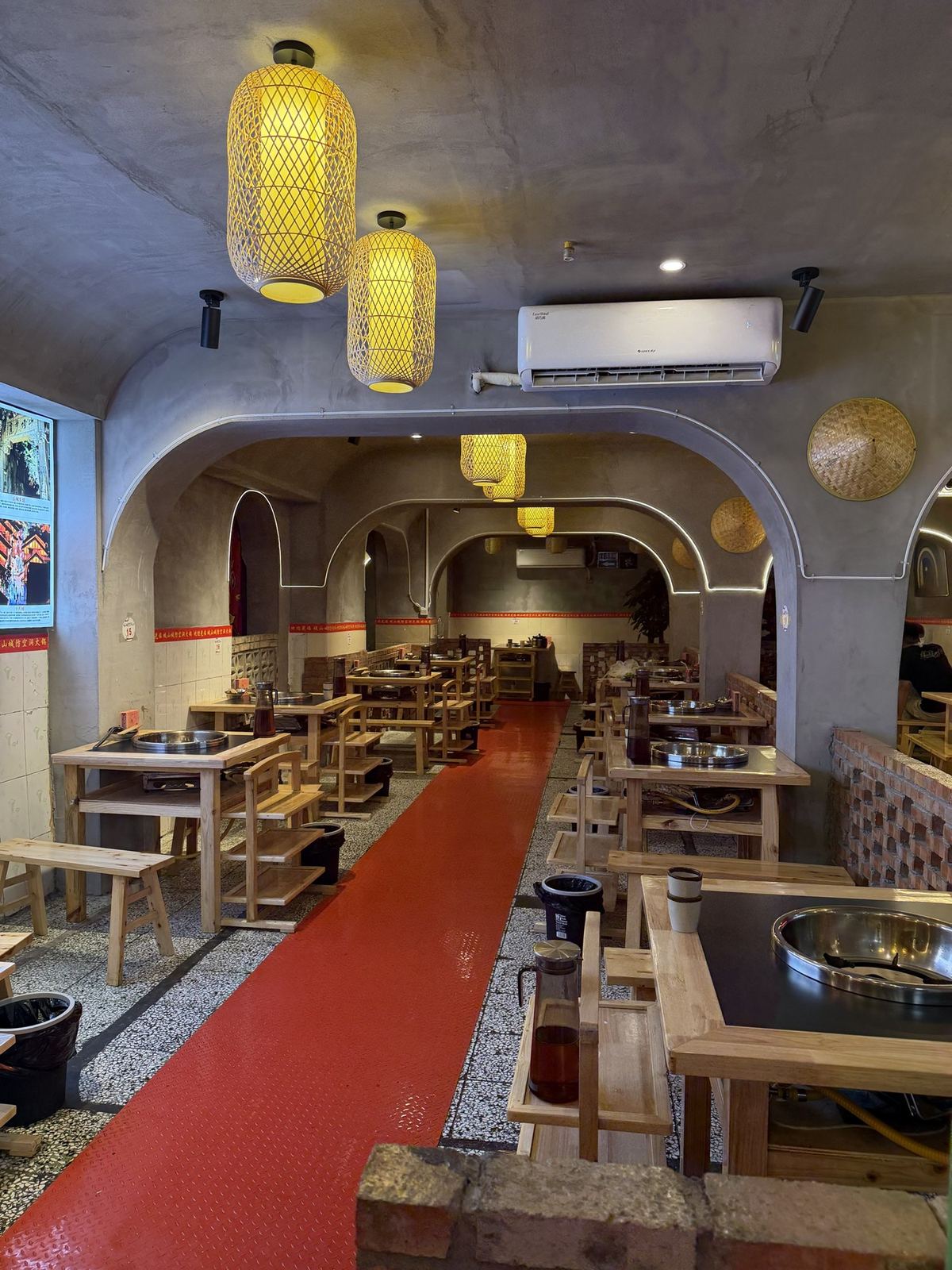Hotpot tables inside a vaulted wartime air-raid tunnel in Chongqing