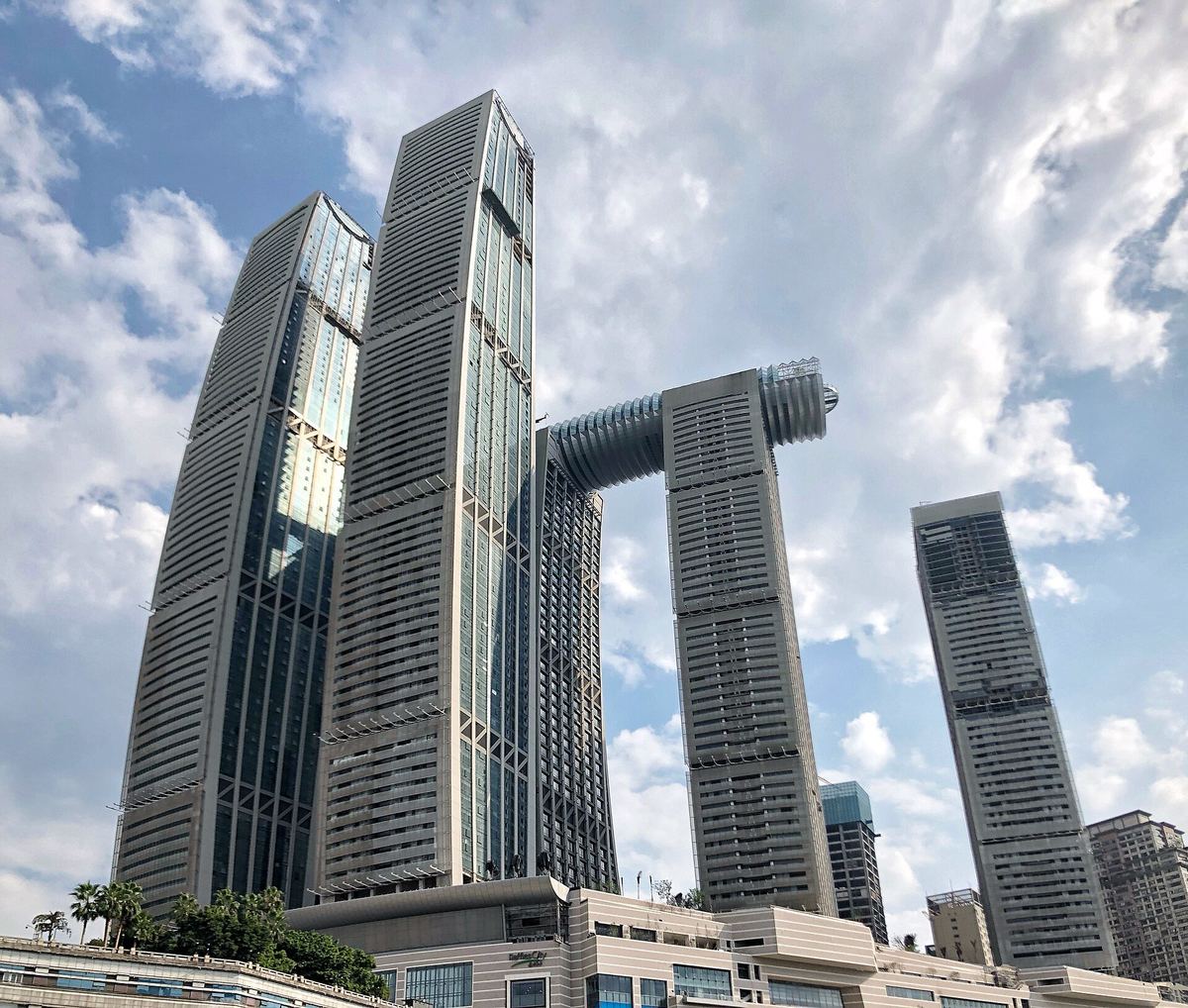 The four towers of Raffles City Chongqing with The Crystal skybridge lying across their tops