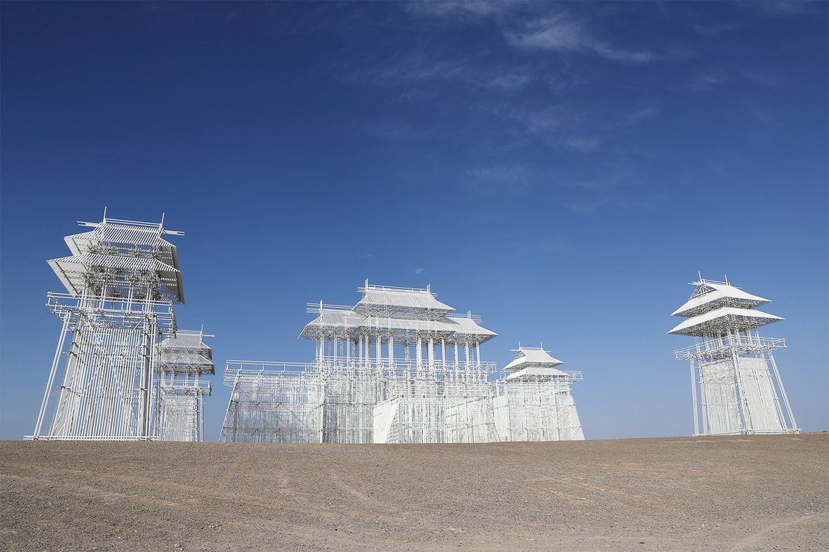 Boundless, a white palace sculpture of steel pipes in the Gobi desert of Guazhou