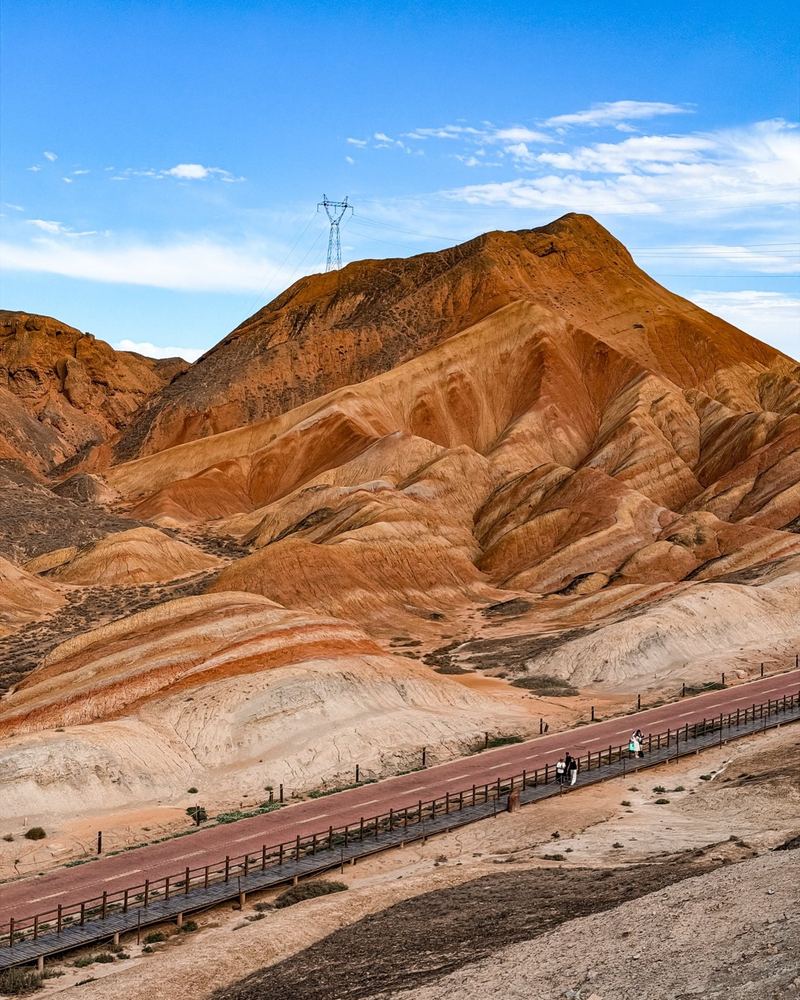 The boardwalk below a striped peak in the Zhangye Danxia