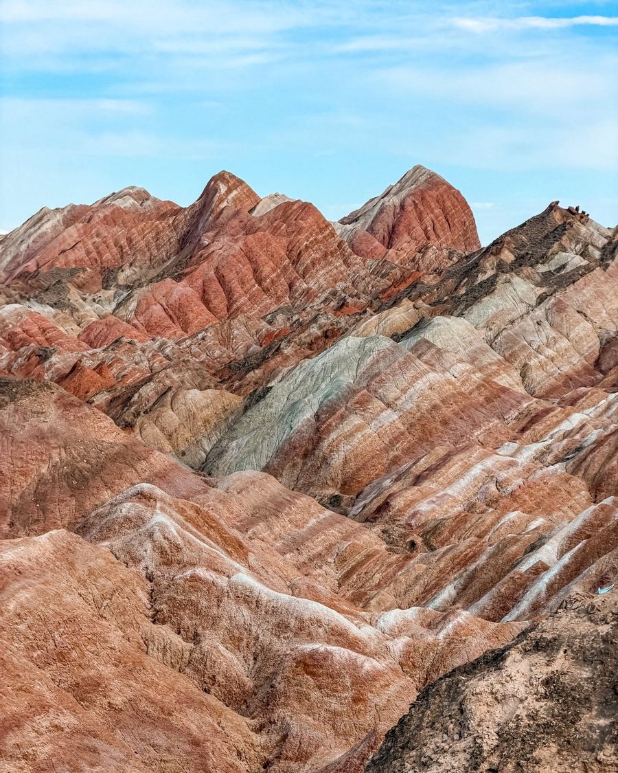 Red, white and green striped ridges of the Zhangye Danxia Rainbow Mountains
